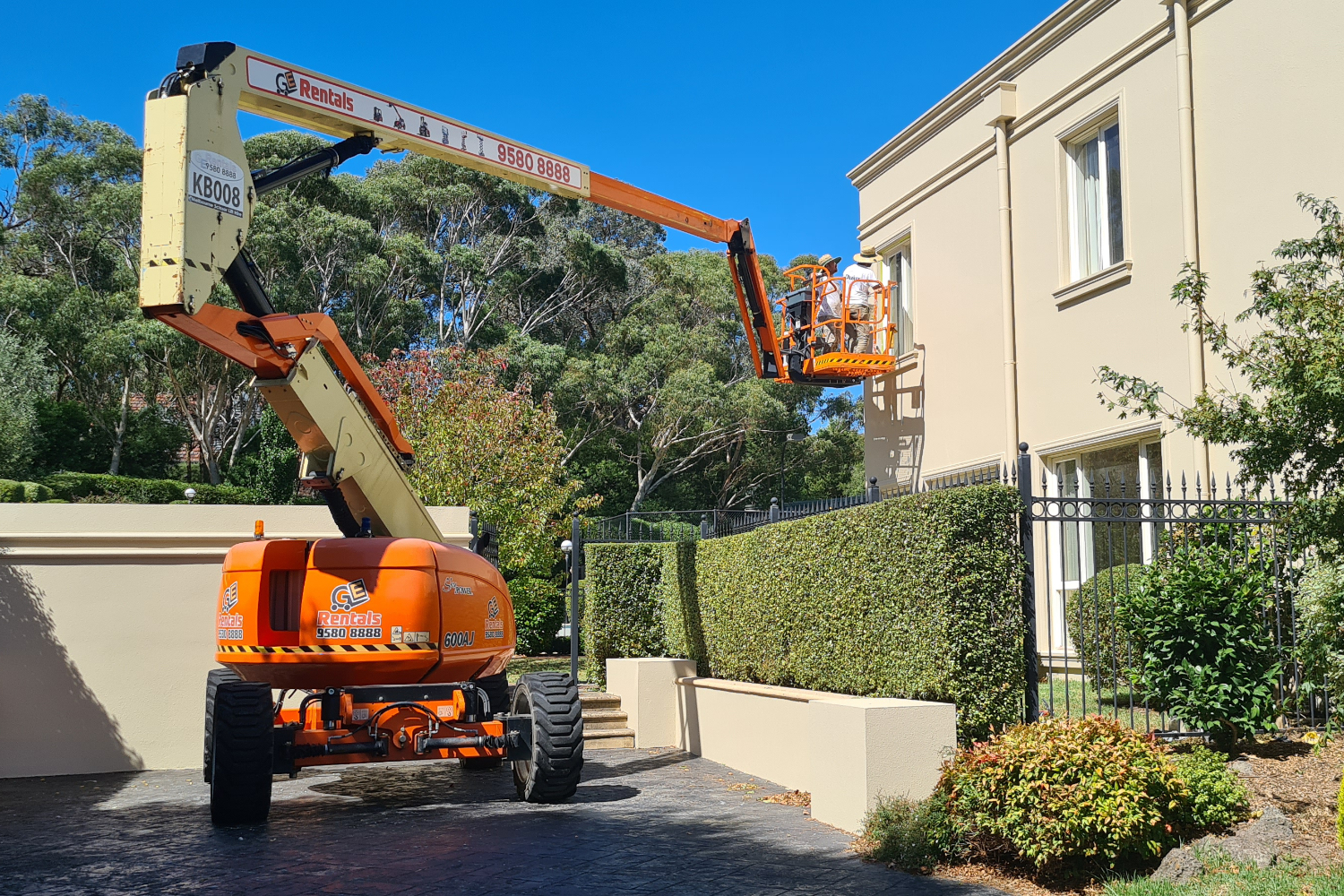 Exterior house painters melbourne and suburbs using a cherry picker 2 exterior house painters using a cherry picker in Melbourne suburb