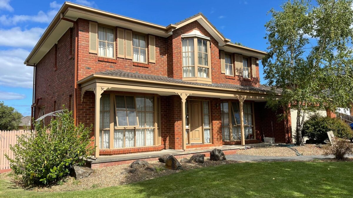 Before the painting project, the house had peeling paint and lacked visual appeal.