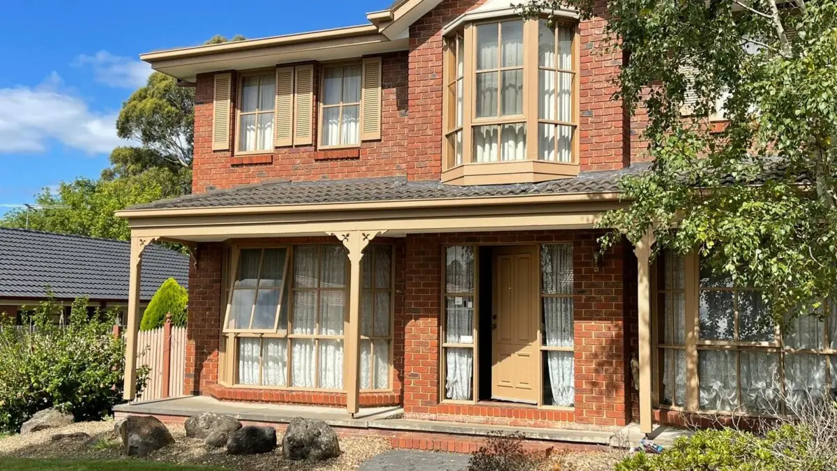 After the project, the house features a fresh, modern look with a durable finish.