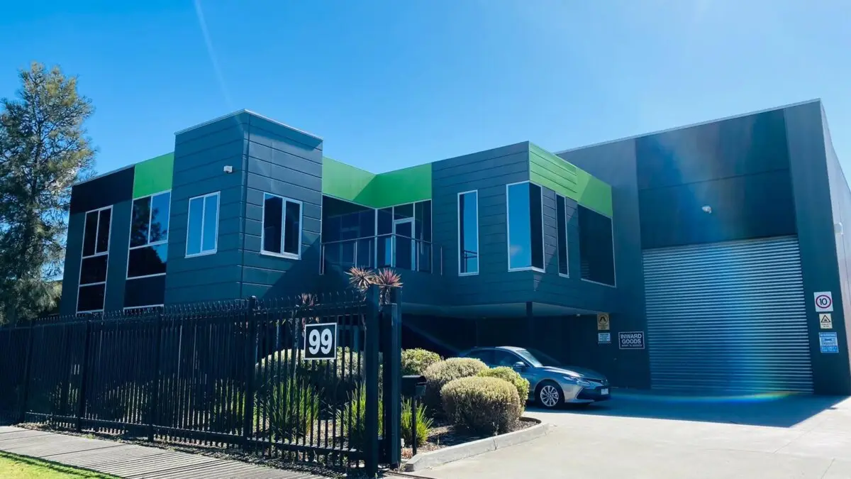 After painting, the warehouse and office feature a refreshed, inviting appearance.